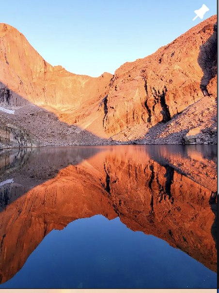 Alpine lake reflection in the Rockies
