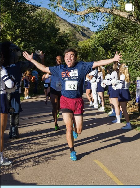 Crossing the finish line at a 5K