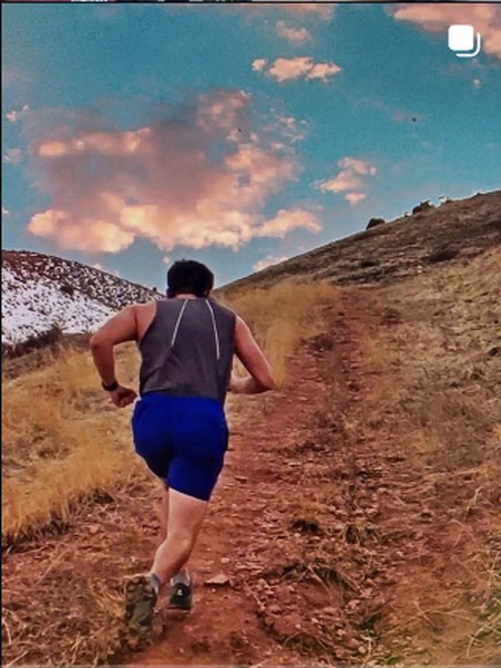 Trail running into the sunset