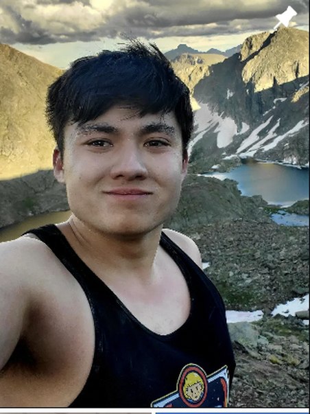 Selfie with mountains behind