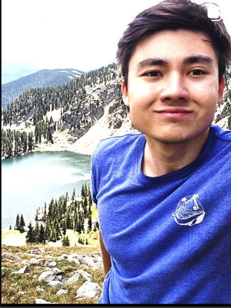 Portrait by an alpine lake