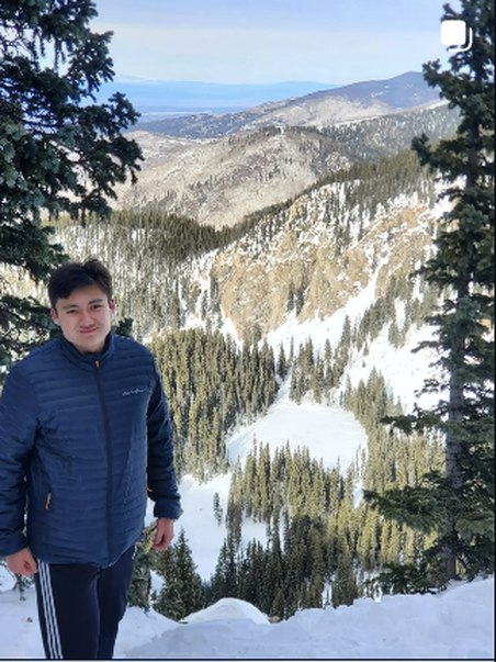 Standing on a snowy overlook