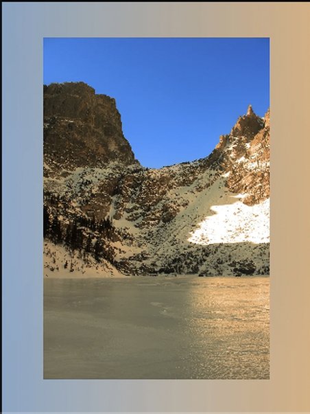 Rocky cliff under a blue sky