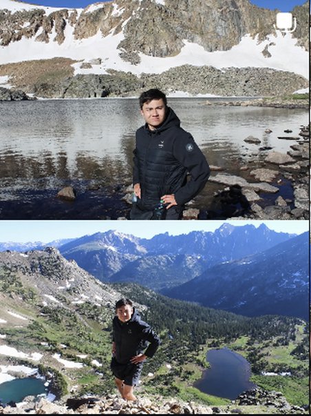 Standing at a mountain lake overlook